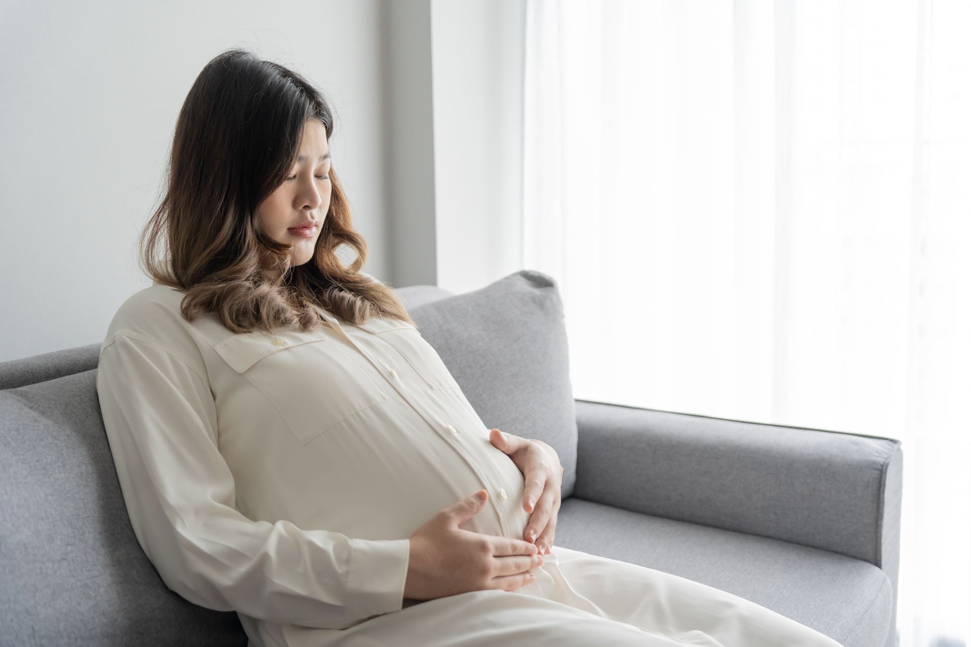 How to Reduce Pelvic Pain When Rolling Over in Bed During Pregnancy