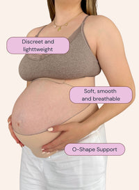 Pregnant woman wearing a brown maternity bra and belly band