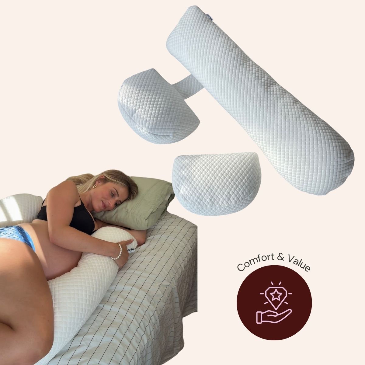 Woman sleeping on a bed with various pillows displayed around her.