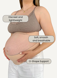 Pregnant woman wearing a brown maternity bra with text highlighting features on a beige background