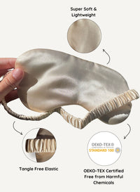 Silky sleep mask held by a hand with text highlighting features on a white background