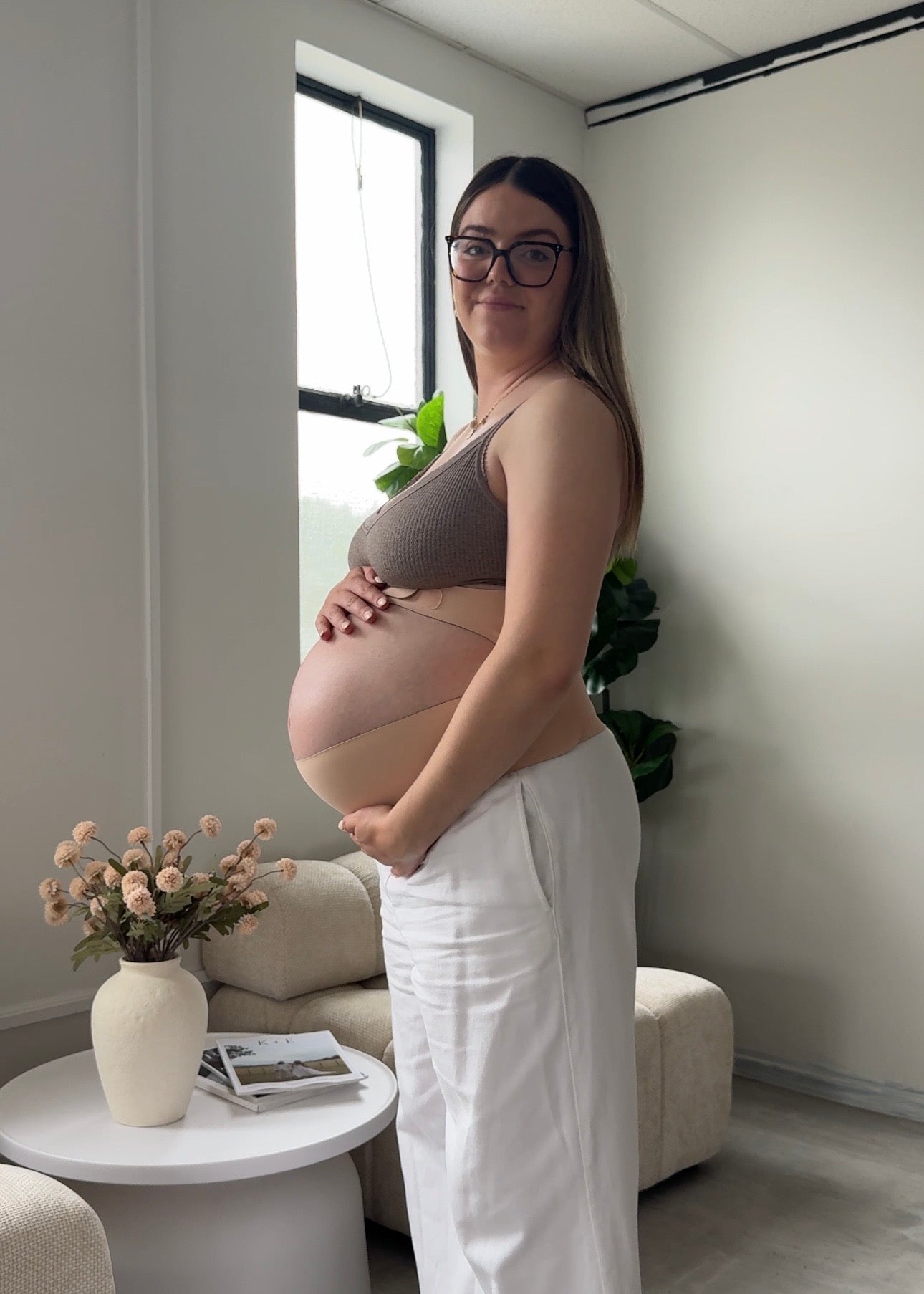 pregnant woman wearing belly band